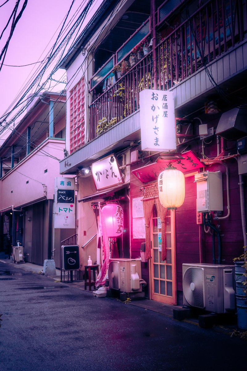 Lightroom's tweet image. Neon drizzle. Quiet chaos. Tokyo, as felt by @tokyoluv 🚦 #MadeLightRoom