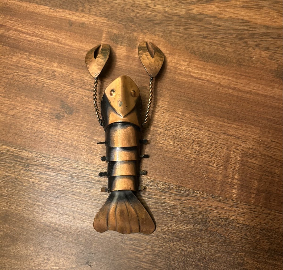 szacharek's tweet image. At last, I have acquired the circa 1950 Frank Rebajes articulated copper lobster brooch I have wanted for—no joke—20+ years. Pic 3 is a postcard of the Rebajes store on 5th Ave, which he opened in 1942. Doesn’t it look amazing? Wish I had a time machine!