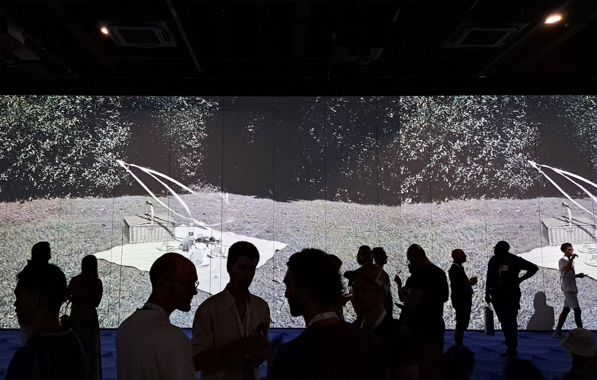 Last thursday I got to attend TezDev 2025 and showcase 5 wonderful artists in a super cool exhibition! I wanted to show you how it was! (🧵)

[seen here: "Picnic Dance" by <a href="/lilyillo/">lilyillo</a>]