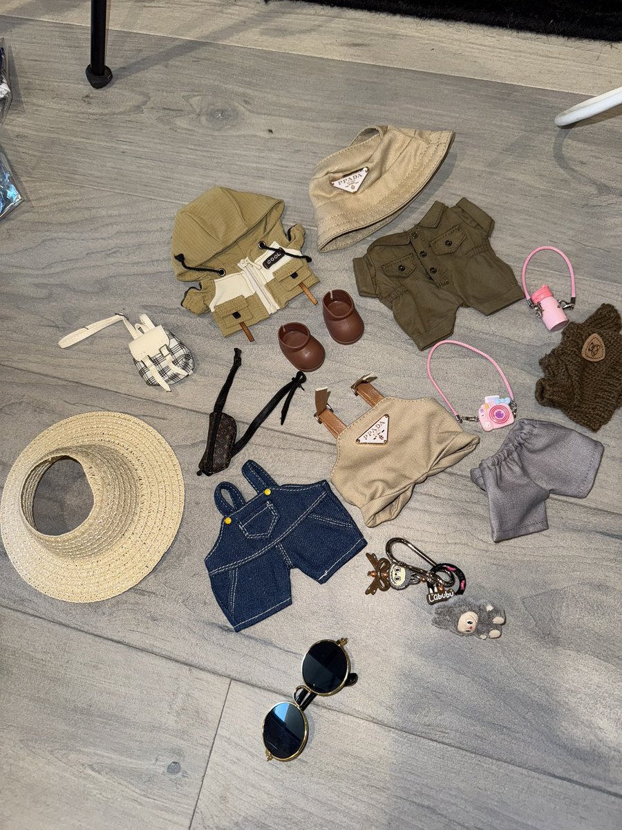 ijustine's tweet image. Guess where I’m going based off the clothes I’m packing for my Labubu..