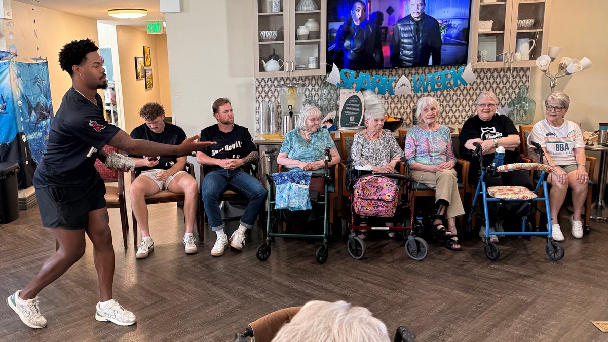 A trio of Dust Devils pitchers - Ryan Costeiu, Najer Victor, &amp; Bridger Holmes - competed in a heated game of bean bag baseball this morning. They battled alongside residents of Hawthorne Court retirement community. The residents were definitely the experts in this one!