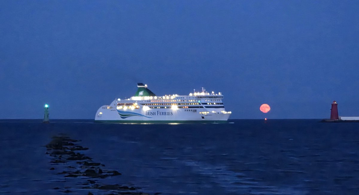 Lots going on here &amp; a nice surprise after an evening stroll... a moon rising...a Ferry on the way into Port...lighthouses.... #DublinBay