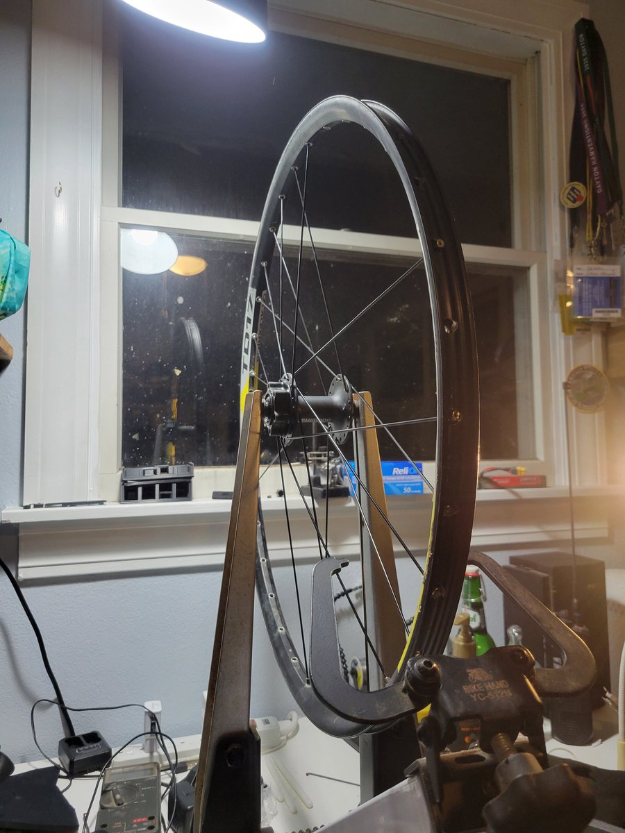 kf8ki's tweet image. I'm busy respoking a mountain bike wheel. What masochistic fun are the rest of you up to this evening? 🤪