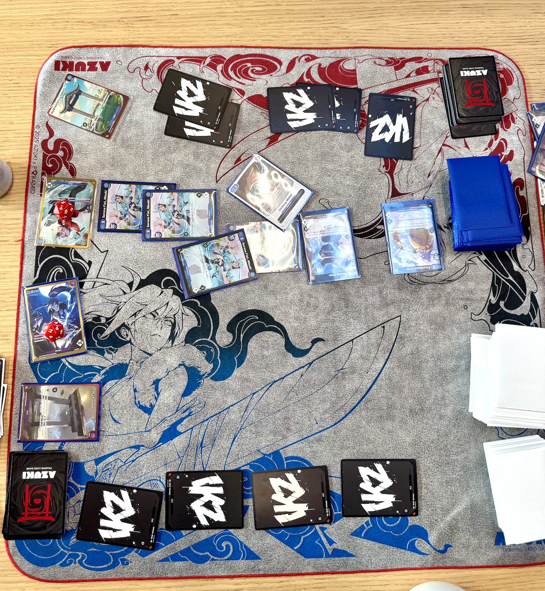 the <a href="/AzukiTCG/">Official Azuki TCG</a> is crazy fun