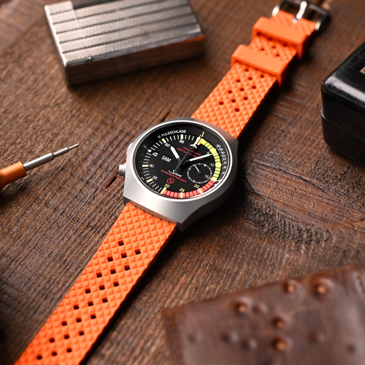 ⌚️: Sinn 157 EZM-4
Strap: @strapcode⁠
Strap Model: FKM07J
⁠
The orange section of the special chronograph utility Sinn 157 EZM-4 Chronograph features is further spotlighted by a FKM Quick Release Rhombus Orange Rubber watch strap, not solely for aesthetic purposes.