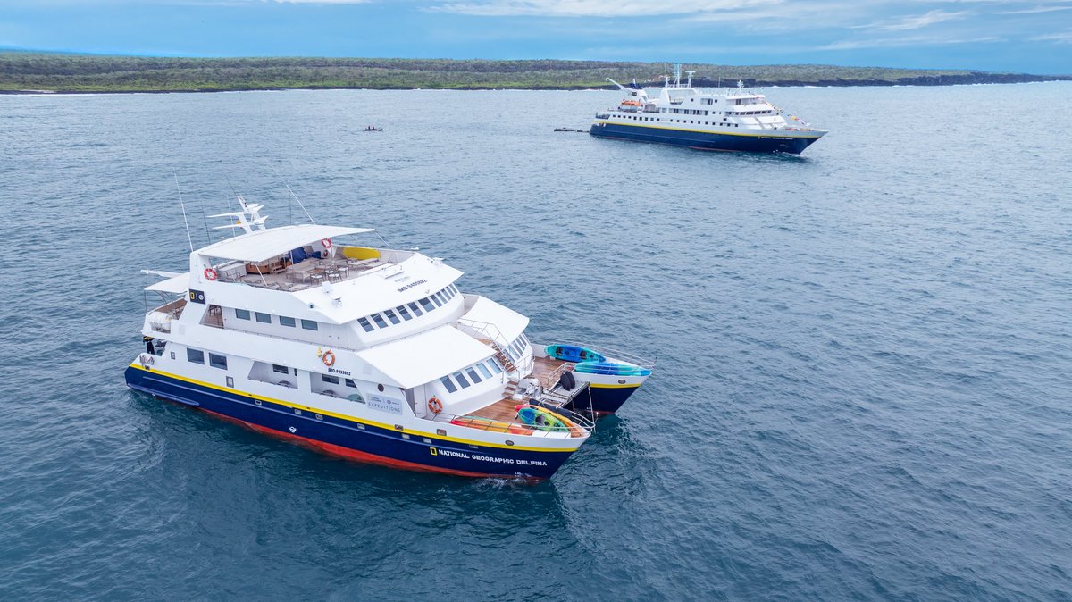 cruise_lowdown's tweet photo. Photos of the powerful moment yesterday in the Galápagos 🌊 that @LindbladExpeditions officially christened National Geographic Delfina and Gemini in Academy Bay, celebrating community, conservation, and nearly 60 years of exploration #ExpeditionCruise  #CruiseNews https://t.co/ug508lxvZc