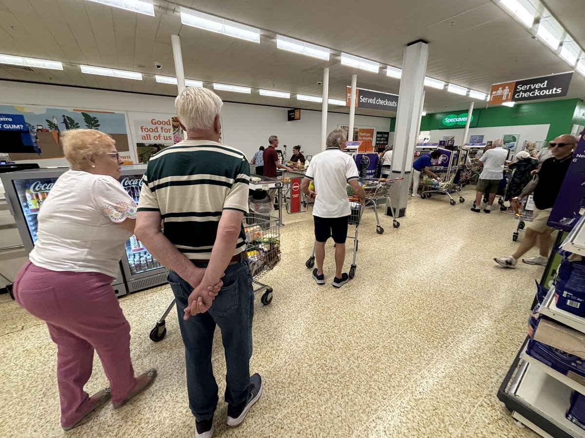 Dear <a href="/sainsburys/">Sainsbury's</a> almost no one at your self service checkouts and long queues at the manned checkouts. Not impressed.