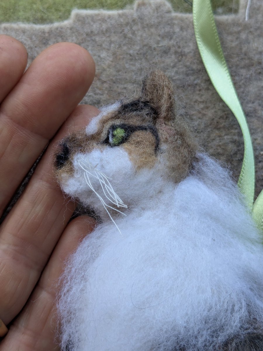 She's done. I've been thinking a lot about eye placement and how to translate that to what is essentially a flat piece. Predator eyes are on the front of the face, where as herbivores like sheep are more on the side. A stitch or two in the right place makes all the difference!