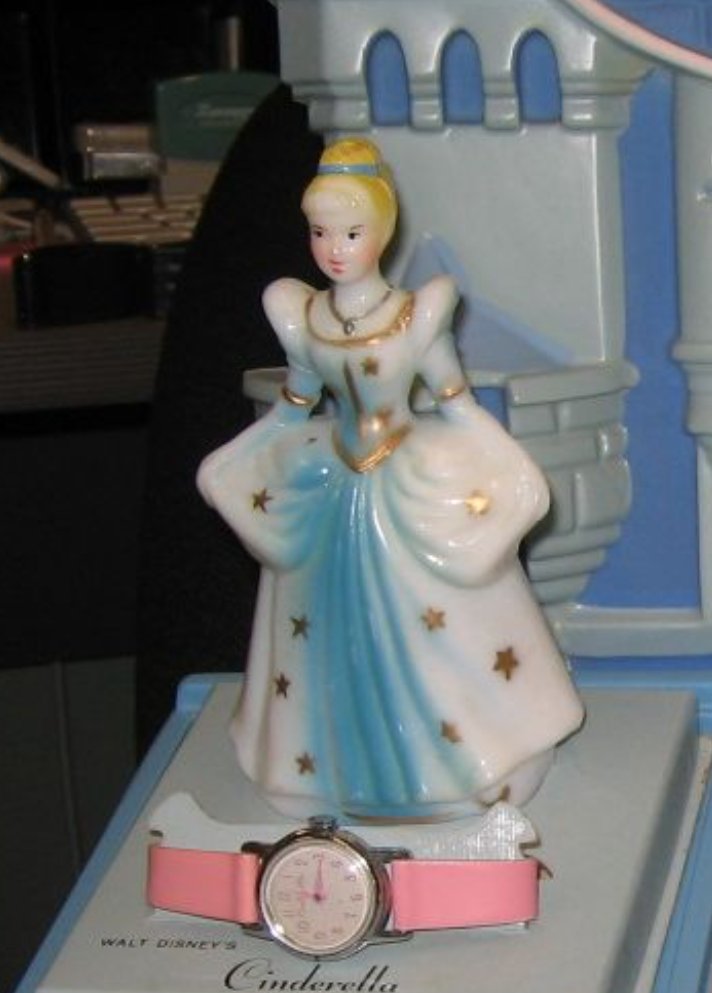 My 1st watch late 60's early 70's with a porcelain doll of Cinderella
