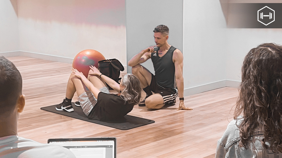 Teaching abdominal curls? It’s more than just lifting the shoulders off the floor, it’s about precision and control.

Start by cueing a neutral spine, then ask the client to gently press their lower back into the mat as they exhale. The movement should come from the ribs drawing
