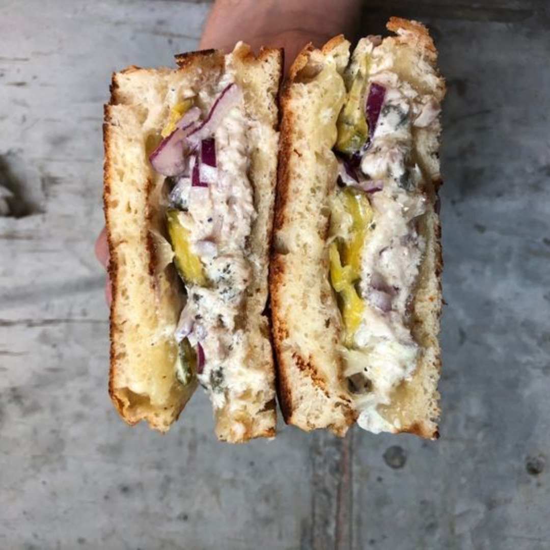 Our tuna sammie is just the thing for a hot, humid day. House-made tuna confit, draped in Swiss cheese, topped with bread-and-butter pickles and red onion, all on toasted milk bread. Head to the @durhamfoodhall or order online here order.toasttab.com/online/locals-…