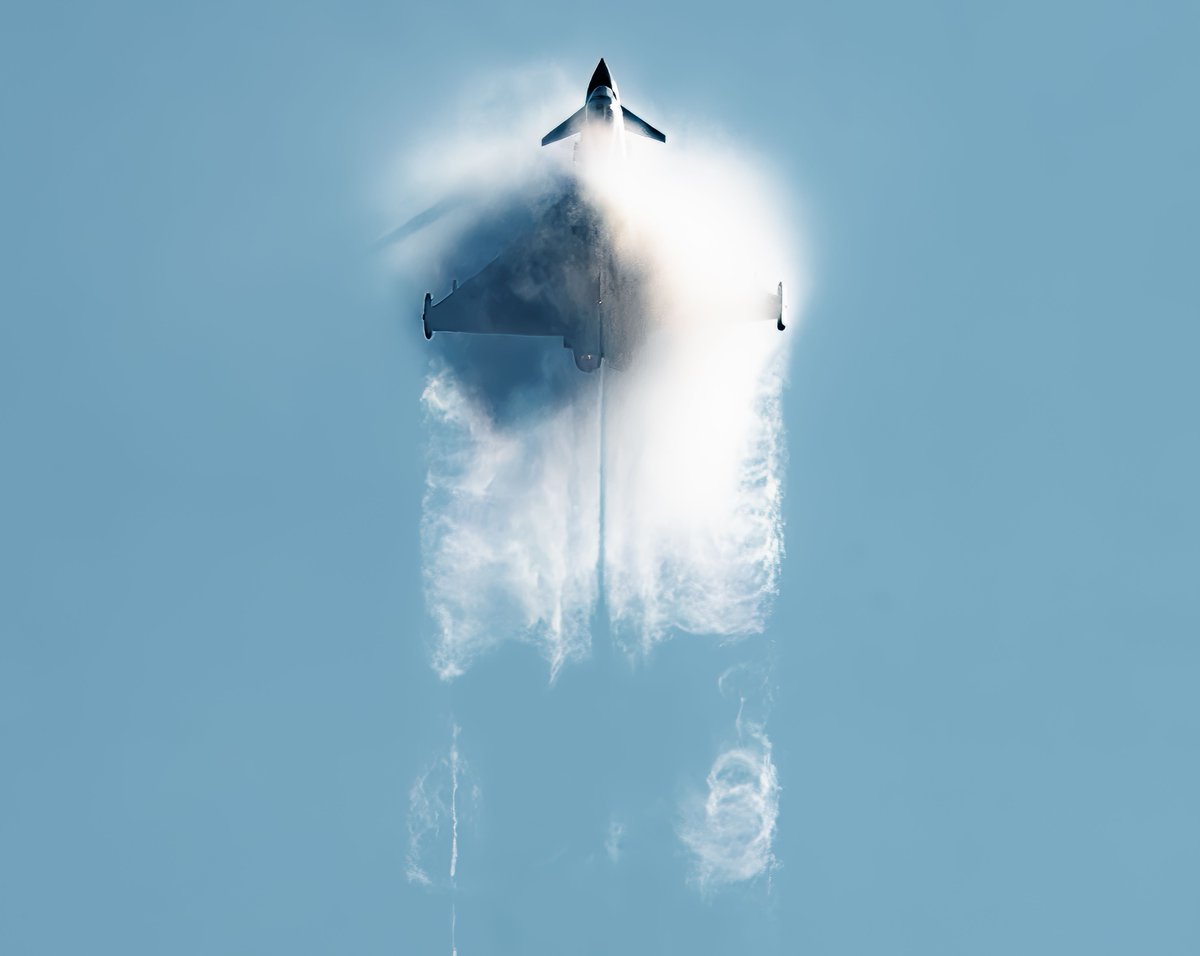 Eurofighter Typhoon (@eurofighter) on Twitter photo Some pictures just defy reality, and we’re treating you to one this ‘Phoon Friday 🤯 
  
This still image of the Eurofighter Typhoon is a perfect visualisation of the jet’s power, bursting through the sky with sheer grace. 
  
The perfect blue skies surrounding the disrupted Some pictures just defy reality, and we’re treating you to one this ‘Phoon Friday 🤯 
  
This still image of the Eurofighter Typhoon is a perfect visualisation of the jet’s power, bursting through the sky with sheer grace. 
  
The perfect blue skies surrounding the disrupted