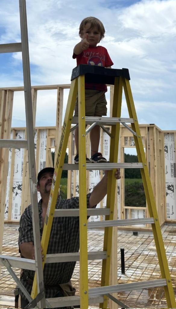 New apprentice. Great nephew Gray helping us build his new house. Kids a beauty. #THUMBSUP