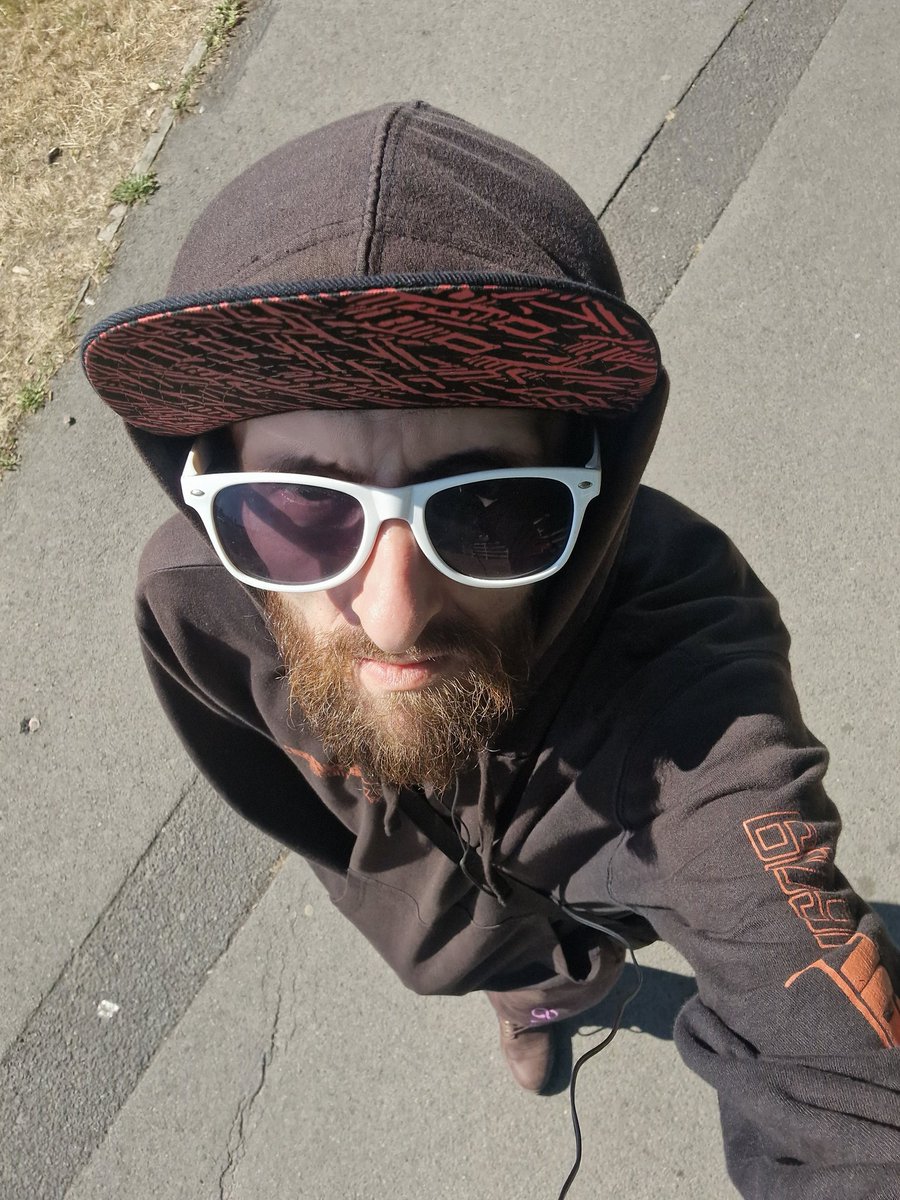 31° and I'm in a black hoodie and sweatpants.
For some reason, I care more about people potentially being able to see my body than I do about dehydration.