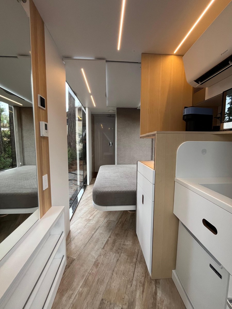 HausMicro's tweet photo. High-tech comfort in the heart of nature 🌲✨ #microhaus combines advanced systems, smart design, and sleek aesthetics all in one compact unit. Where would you place yours? #technology #smarthome #tinyhome #prefab #innovation #adu https://t.co/syPc0ZzDFX