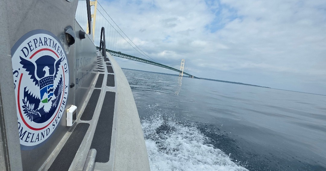 USBPChiefDTM's tweet photo. #BorderPatrol agents from the Sault Ste. Marie Station patrol under the Mackinac Bridge in preparation for the upcoming Bayview Mackinac Boat Race. The sailboat race is one of the longest fresh-water races in the world.
#bycmack #sailing #bayviewyachtclub #DetroitSector https://t.co/vT1Klap1ut