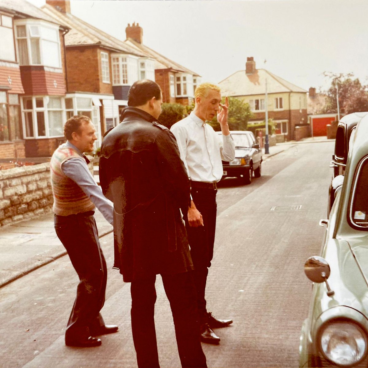BLIMEY! WHAT A FIND! Disney has found some photos of the making of ‘THE BUSHES SCREAM WHILE MY DADDY PRUNES’ film! Here’s a taster… Billy Benson, The Shend and me, admiring the vintage Ford van with its TVT livery, in a Newcastle street closed off for filming. #Postpunk