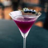 in that case . . .  how about something like a Sapphire Shot ?  A blueberry spirit mixed with a hint of scotch, with a blueberry on the rim of the glass to top it all off !