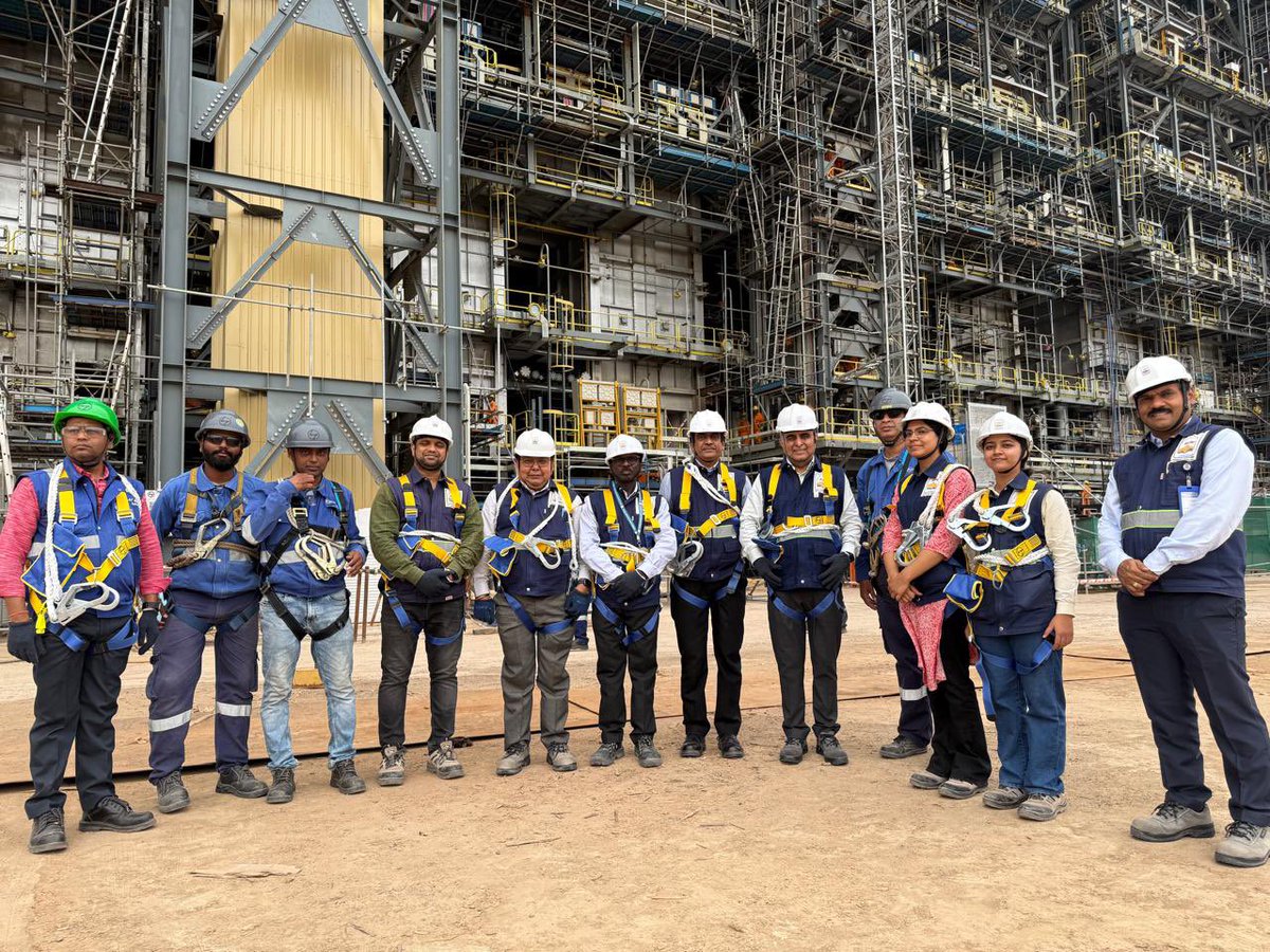HPCL's tweet photo. On  July 11, 2025, our  C&MD  visited the Dual Feed Cracker Unit (DFCU) furnaces at the Rajasthan Refinery Project (RRP) Complex. Demonstrating exemplary commitment to site engagement, he  ascended to the top platform of the furnaces with requisite safety protocols. The platform is located at a height of 45 meters.
 
During the visit, young female officers from the HRRL Projects team provided an insightful briefing about the scale, complexity, and engineering challenges associated with the construction of the DFCU. 

C&MD was deeply impressed by the magnitude and momentum of the construction activities and acknowledged the immense efforts being put in by the Team HRRL.
 
He appreciated the team’s dedication and commitment in building this engineering marvel amidst the challenging conditions of the desert.
#HPCL