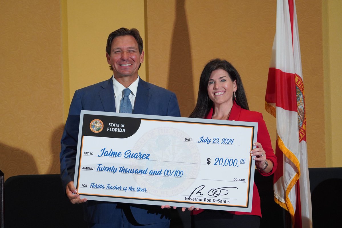 MunichPost's tweet photo. @GovRonDeSantis Ron has broken Ed McMahon's record for most giant checks awarded. https://t.co/HxTaf1VYL8