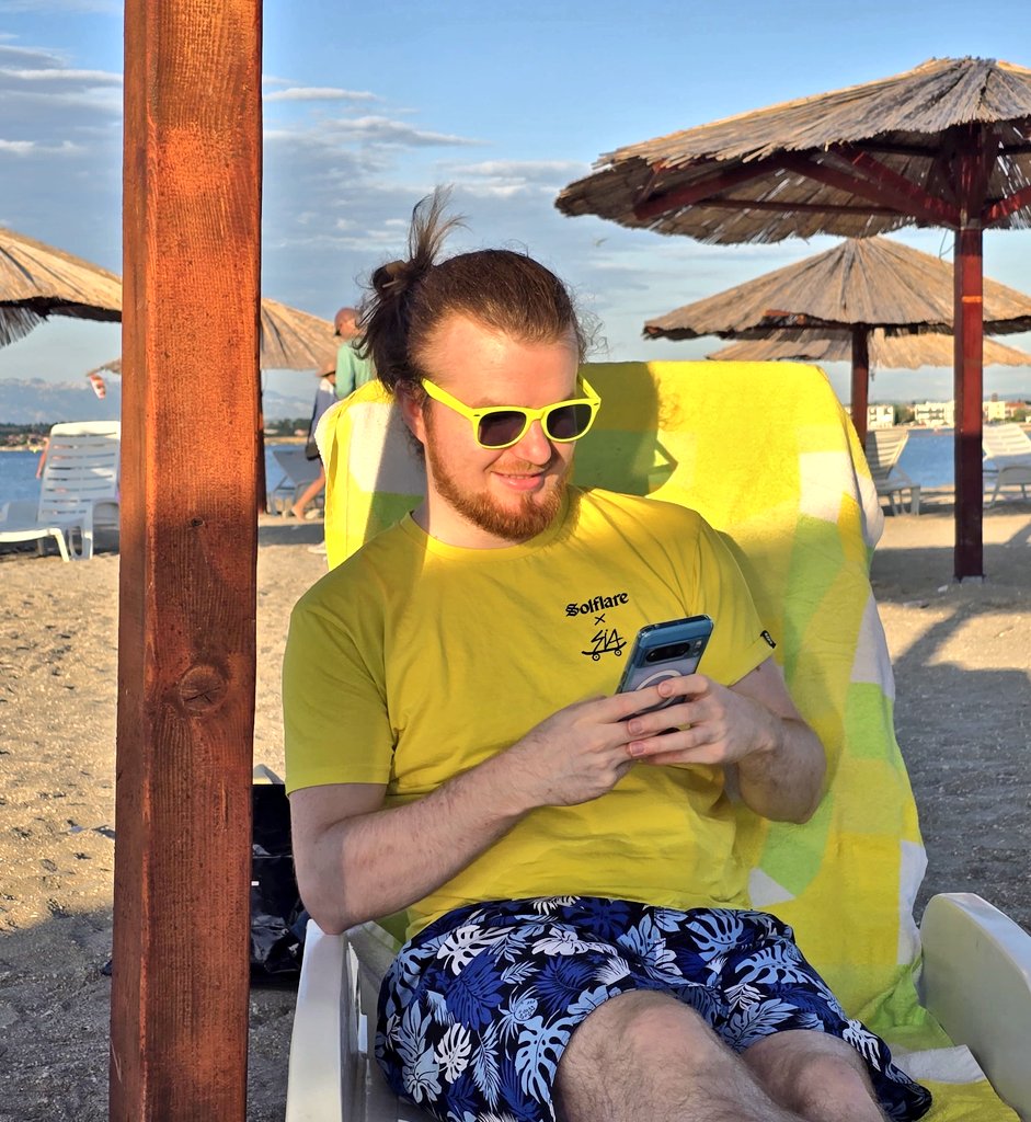 ok, shitposting from the beach in my <a href="/solflare/">Solflare - The Solana Wallet</a> merch as well 🏖️