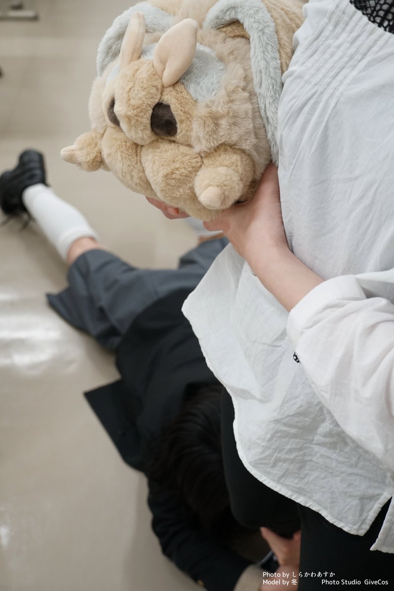 life_with_moth's tweet image. A big, fluffy moth being carried by the class teacher
