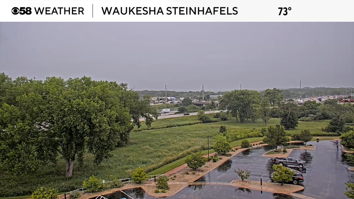 Here's a look at the steady rain falling in Waukesha at this time. Time is 2:06pm