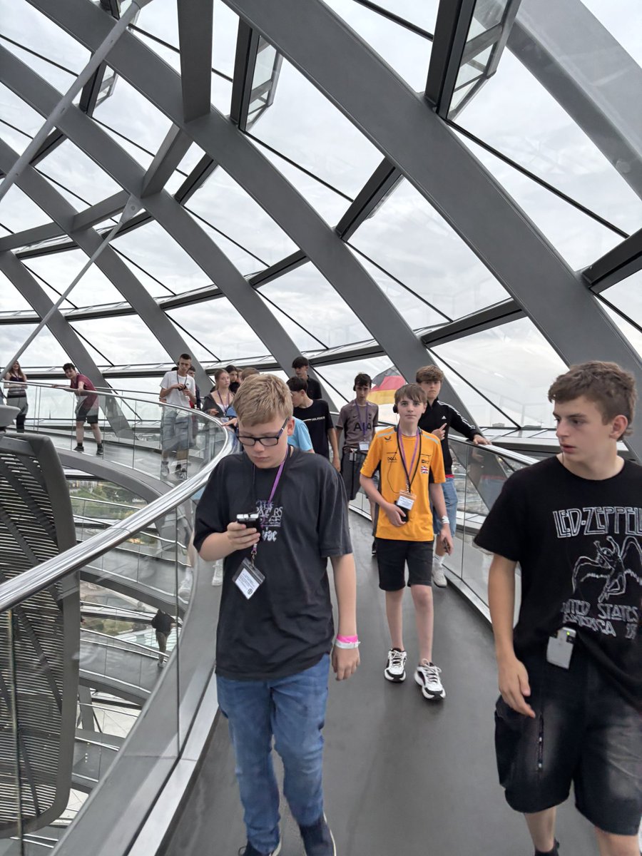 WorthingHighOut's tweet photo. Just toured the Reichstag . Walked through history and up Norman Foster’s iconic glass dome; breathtaking views and powerful symbolism of democracy. #Berlin #Reichstag #StudentTrip #HistoryAlive https://t.co/iKXVDWtiqa