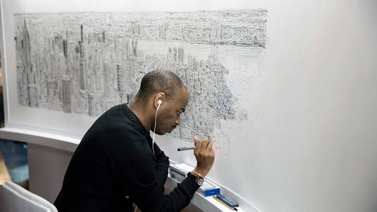 Stephen Wiltshire is a British artist renowned for his extraordinary visual memory and detailed cityscape drawings. He is affected by autism, and due to his remarkable talent, he is often called the "human camera." Stephen can create highly accurate and intricate drawings of
