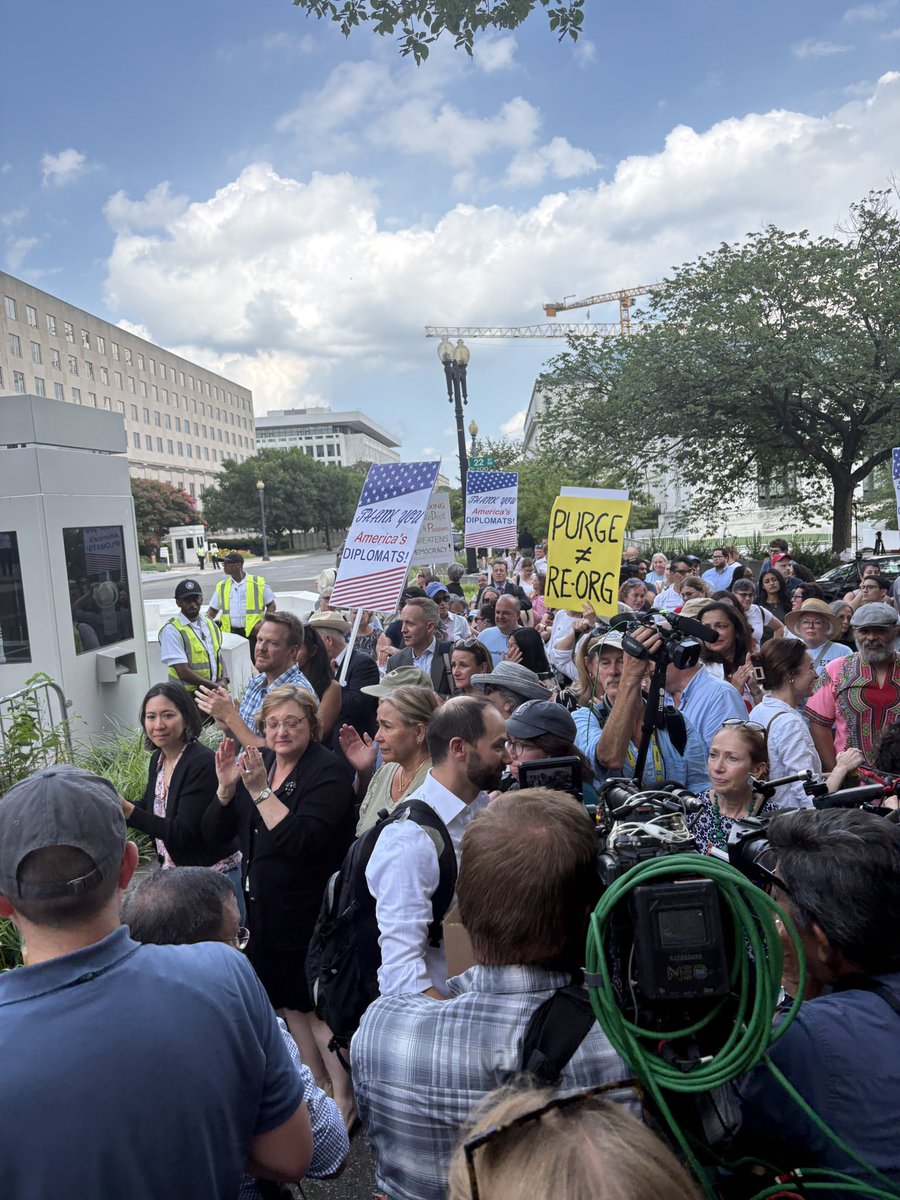 ebazaileimil's tweet image. Emotional scenes outside the State Department today as employees affected by a sweeping reduction in force leave the building. Current employees and supporters have lined up to “clap out” departing State Department staff at the department’s HQ in Foggy Bottom.