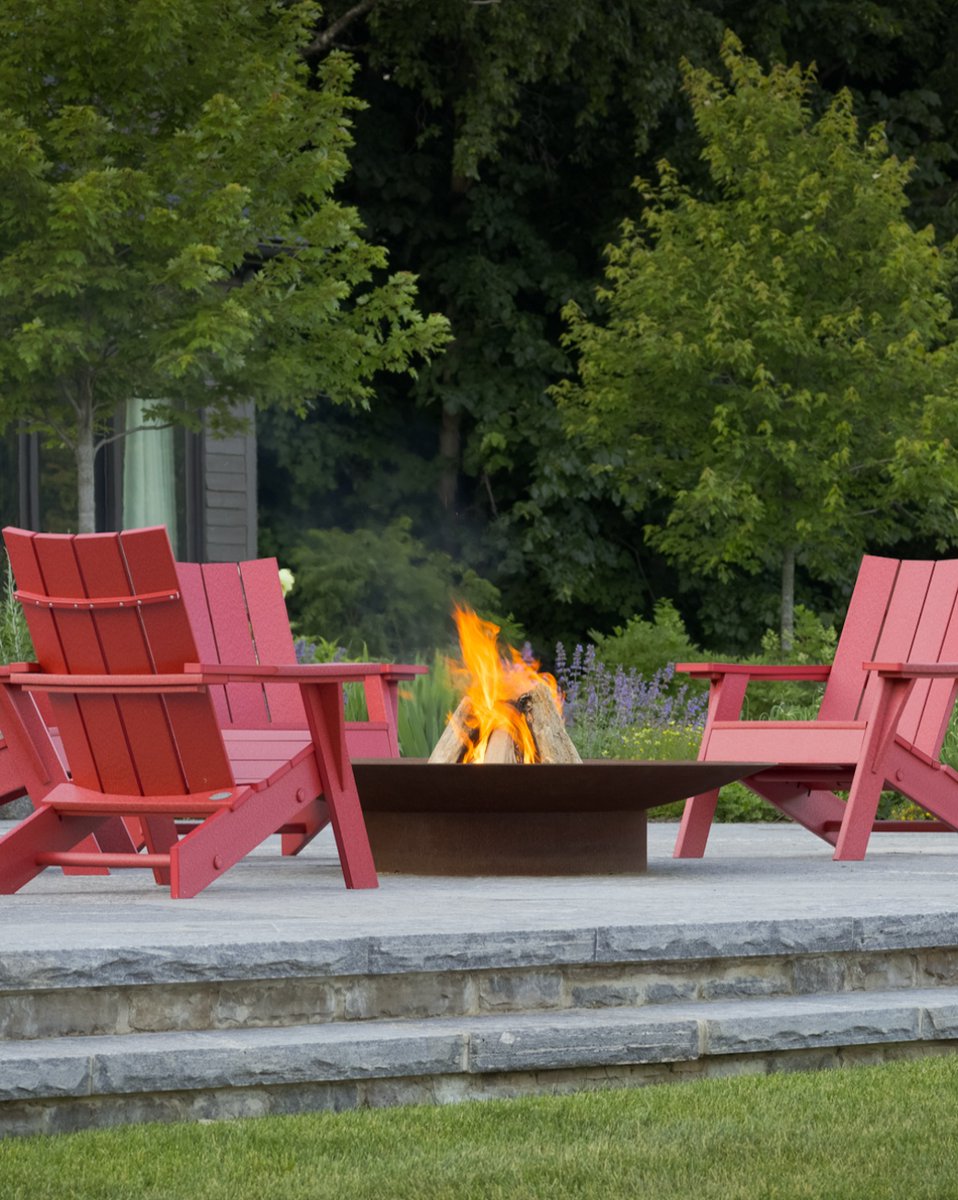 paloform's tweet image. Sit back and stay a while in this simple yet welcoming outdoor setting.  

Surrounded by Adirondack chairs, custom Bol #firepit sits at the center of this #patio, anchoring the space in both function and design.

#paloform