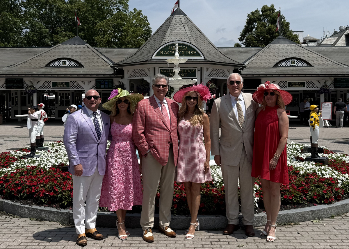 Two of our great clients and the Cahalys dressed up and ready to enjoy the races in Saratoga! 🏇