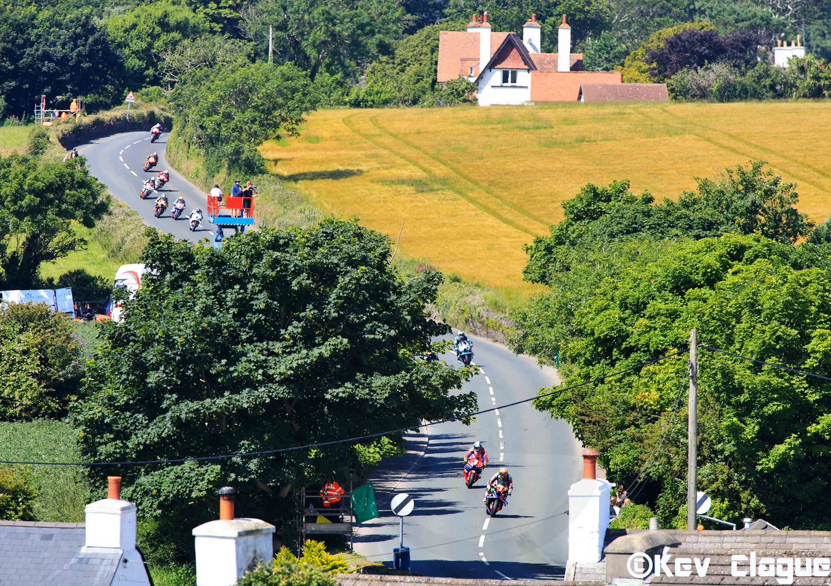 Davey Todd and Dean Harrison lead the way into Cross four ways on lap one, Superbike race 2. Southern 100 2025