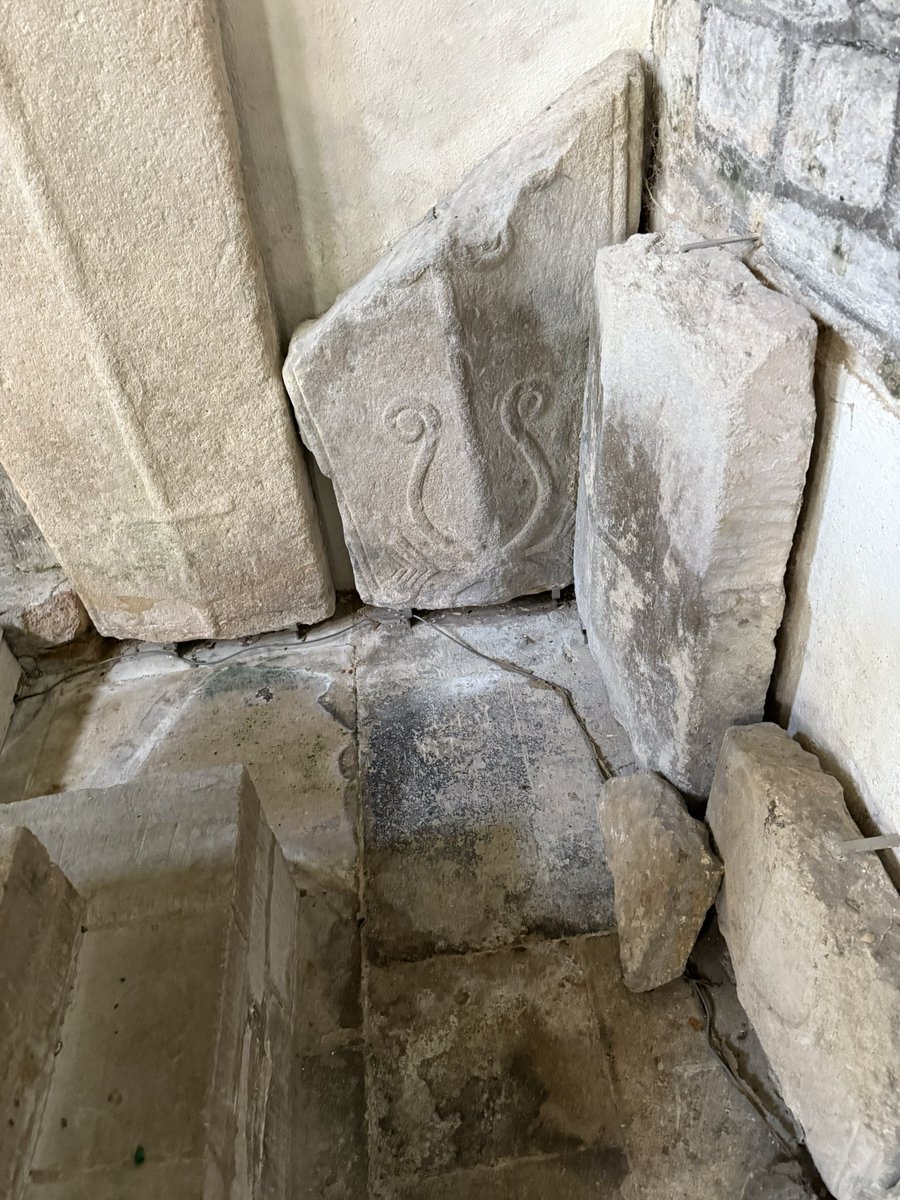 A medley of tomb slab/cover bits at Nassington, Northants.