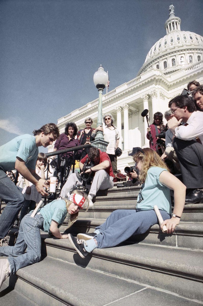 It’s because of disability activists, especially wheelchair users (some of whom were children) who literally dragged themselves up the steps of the Capitol building as protest to get the Americans with Disabilities Act (ADA) passed in 1990.

Pretty hard to ignore that.