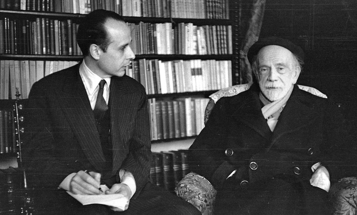 Pío Baroja entrevistado por el fotógrafo y periodista José Fernández Rodríguez en el piso del escritor en la calle Ruiz de Alarcón h. 1950. Sorprende ver a Pío Baroja con abrigo, bufanda y boina dentro de su casa, nos da idea del frío
 que debía de pasar. Fotos en mi custodia.