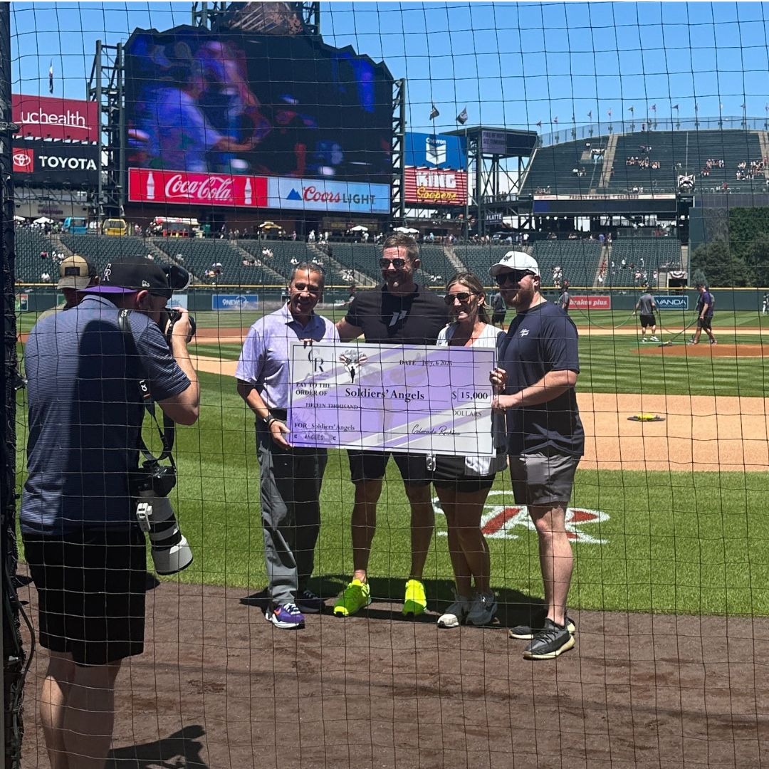 The <a href="/Rockies/">Colorado Rockies</a> Foundation presented <a href="/soldiersangels/">SoldiersAngels</a> with a $15,000 grant at Coors Field during last Sunday’s game!

Denver Area Director, Gina, accepted the check with standout volunteers Noah &amp; Garrick. 

Thank you for recognizing our mission! 
#SoldiersAngels #Rockies #Veterans