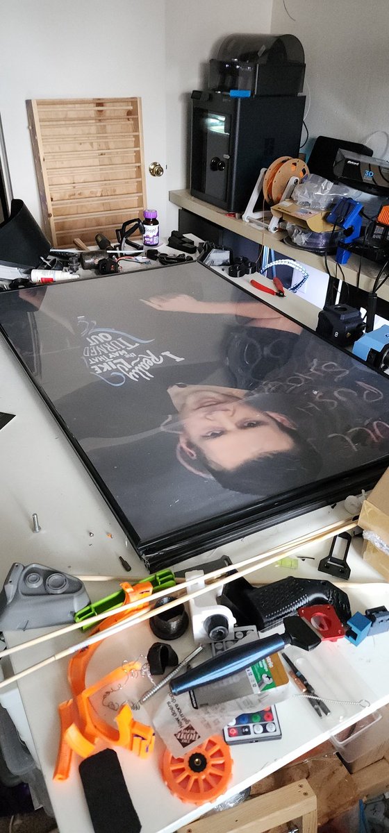 PrintedDiff's tweet image. I only had time this weekend to mock up the frame pieces I have in. Don't mind the messy table, but you can see the very beginning of this printer build size, thanks to a smexy @JazzaStudios poster as reference 😜