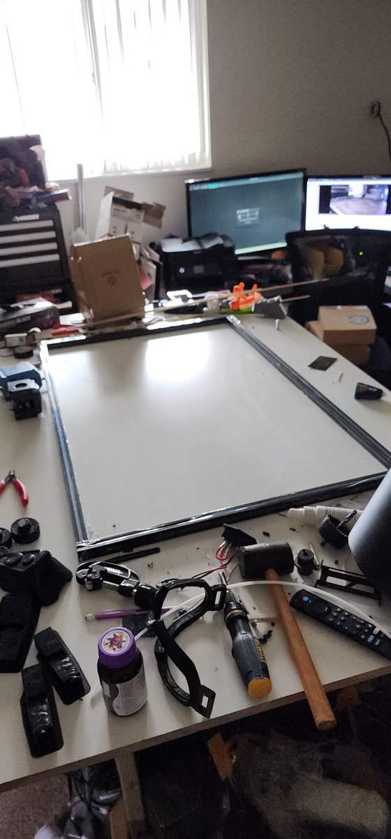 PrintedDiff's tweet image. I only had time this weekend to mock up the frame pieces I have in. Don't mind the messy table, but you can see the very beginning of this printer build size, thanks to a smexy @JazzaStudios poster as reference 😜