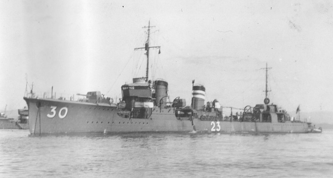 The Imperial Japanese Navy launches a new destroyer, Yaoi, from the docks in Uraga.