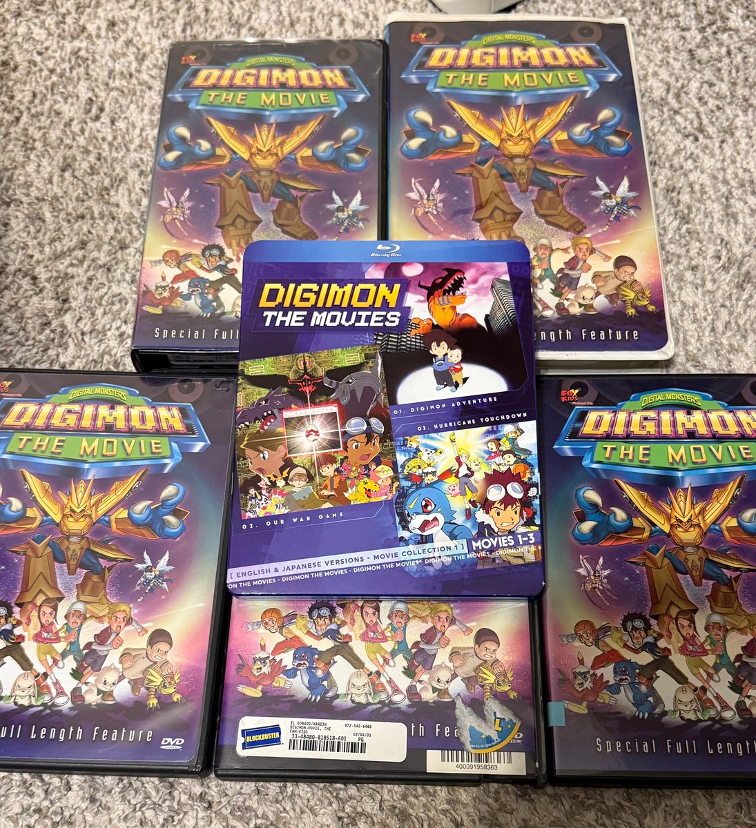 NMFreed's tweet image. Welcome to the family, sixth copy of Digimon The Movie.