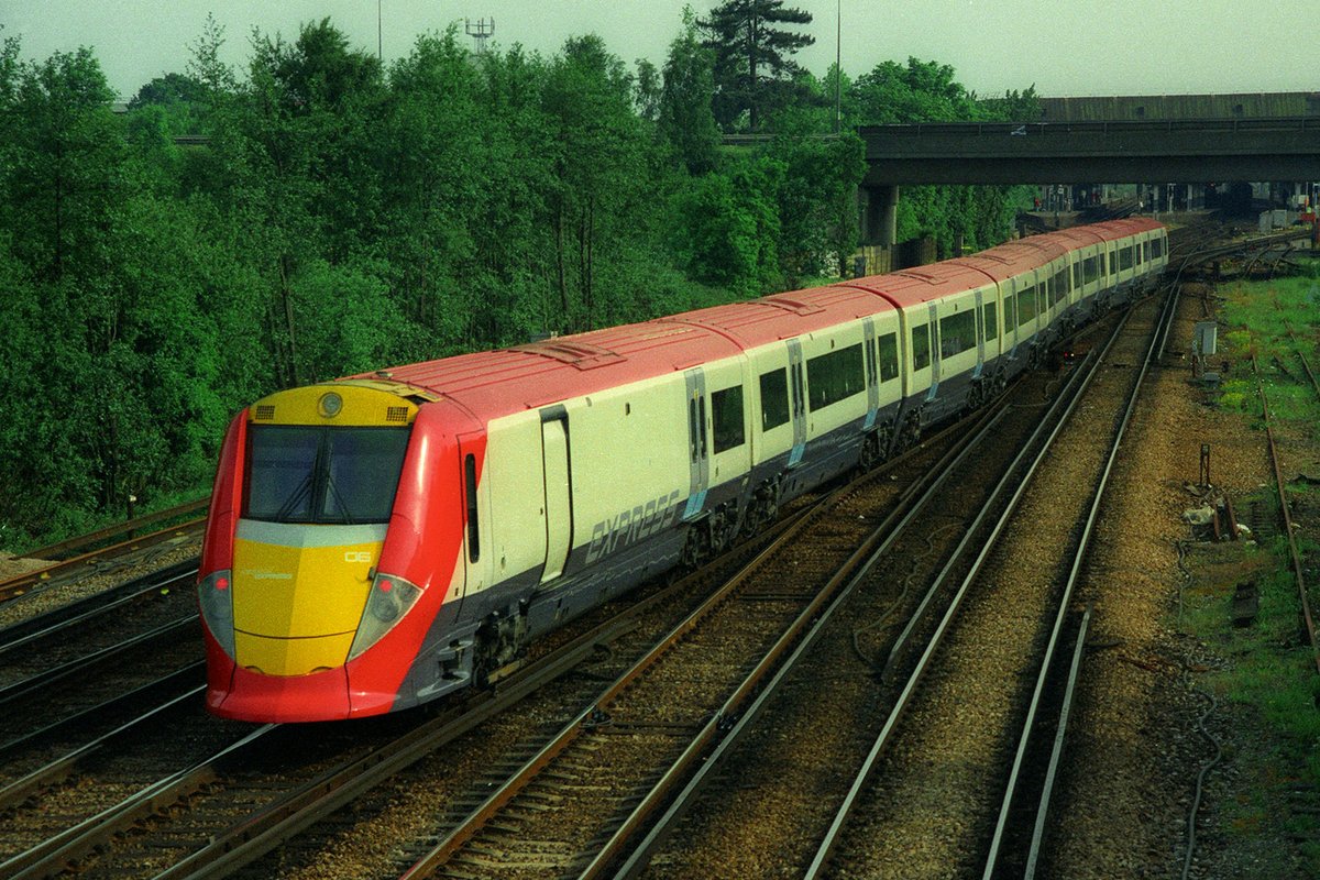 Snapshots from a different time. A few minutes at Gatwick on May 25th 2001, 73208 on the Gatwick Express, 166219 arriving from Guildford, 319006 on a Victoria to Brighton service and 460006 heading back to London.
