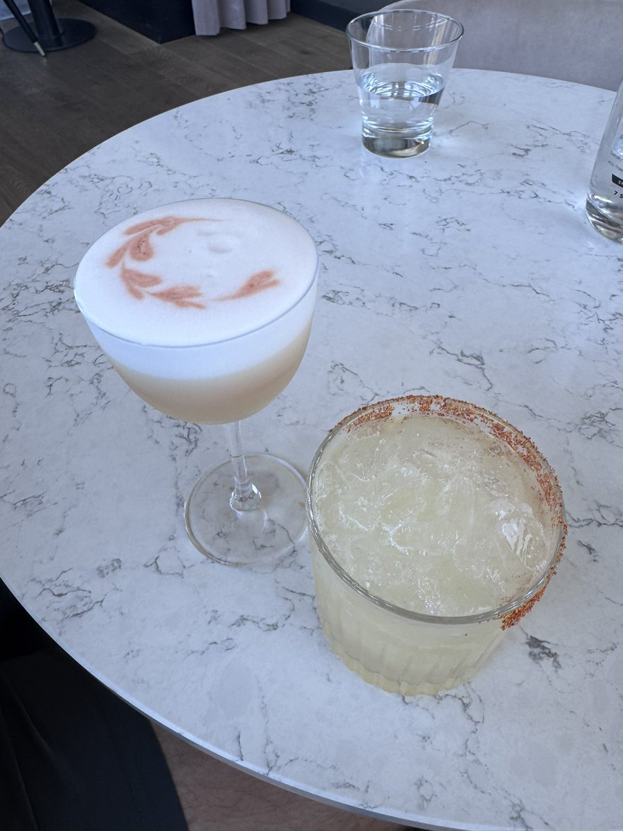 Two gays enjoying some amazing cock-tails.