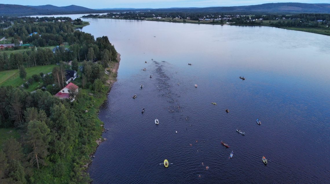 Magical, crazy event. Swim from Sweden to Finland and back to Sweden across the Arctic Circle on the Tornio River that divides the countries. Fun, fun. 

swimac.eu/en