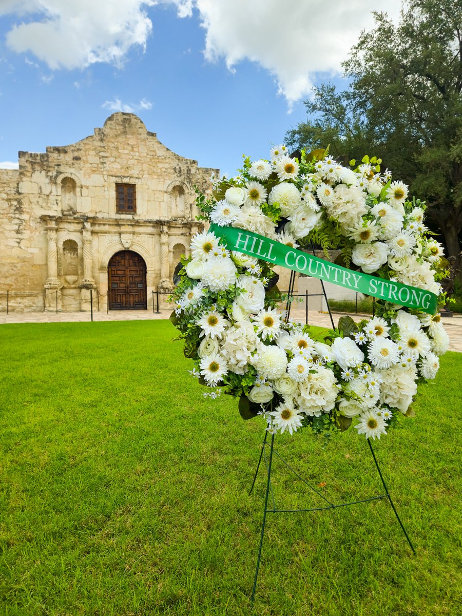 OfficialAlamo's tweet image. To honor those lost and still missing after the devastating Hill Country flooding, a wreath reading Hill Country Strong now rests in front of the Alamo Church. We stand with grieving families, those still awaiting news, and all working toward healing and recovery.