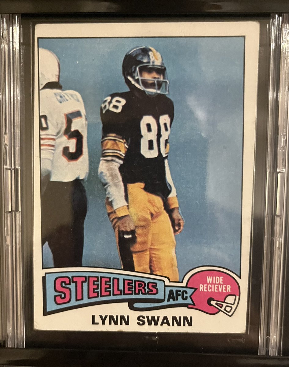 1975 Lynn Swann rookie card. I wish mine was cut better but this card was opened by me at a little store by my house where I grew up in ‘75.<a href="/CardsSteelers/">Steelers Cards</a> <a href="/steelcitystar/">Steel City Star</a> <a href="/304Collector/">The Pittsburgh Steelers Rookie Collection</a> <a href="/SteelCurtainRis/">Steel Curtain Rising</a> <a href="/PittsburghSport/">Steelers Takeaways 🌗</a> <a href="/KIllustrious/">Keith Illustrious</a> <a href="/1947Steelers/">Starless Steelers</a>