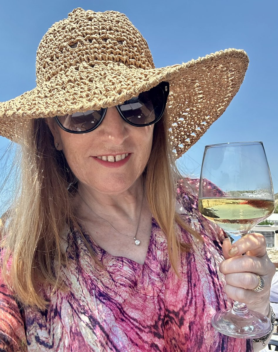 Saturday afternoon by the sea with a glass of wine.