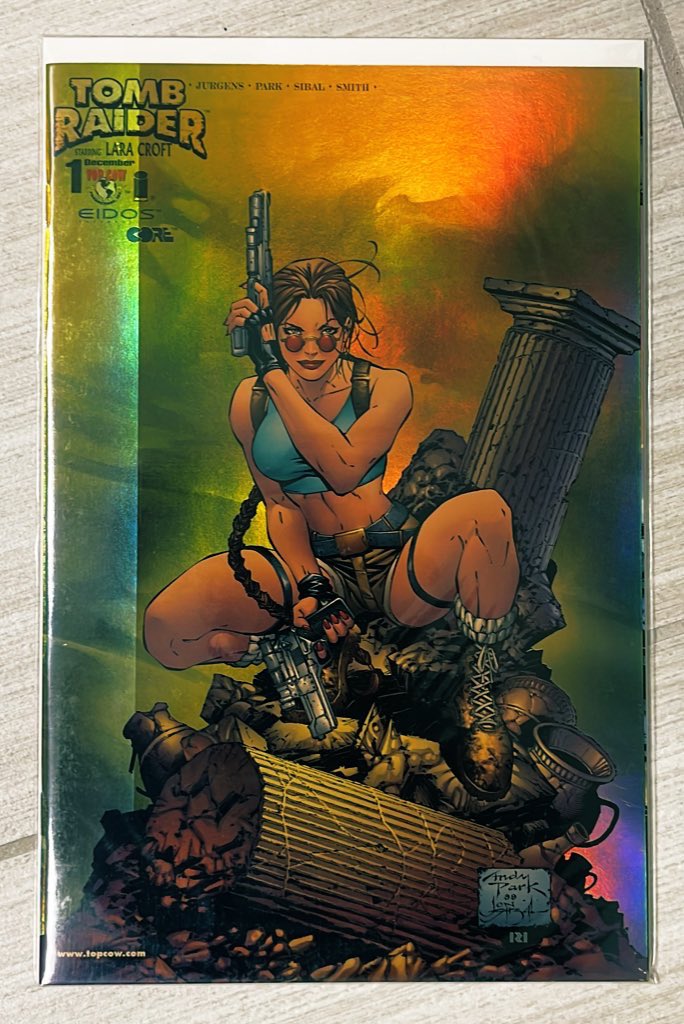 A good Saturday morning, afternoon, evening everyone! Coming to you from the great white north it’s time for today’s random archives comic! It’s the gold foil edition of Tomb Raider #1 by Andy Park! The same image appears on the oversized collection that just came out.. #comics
