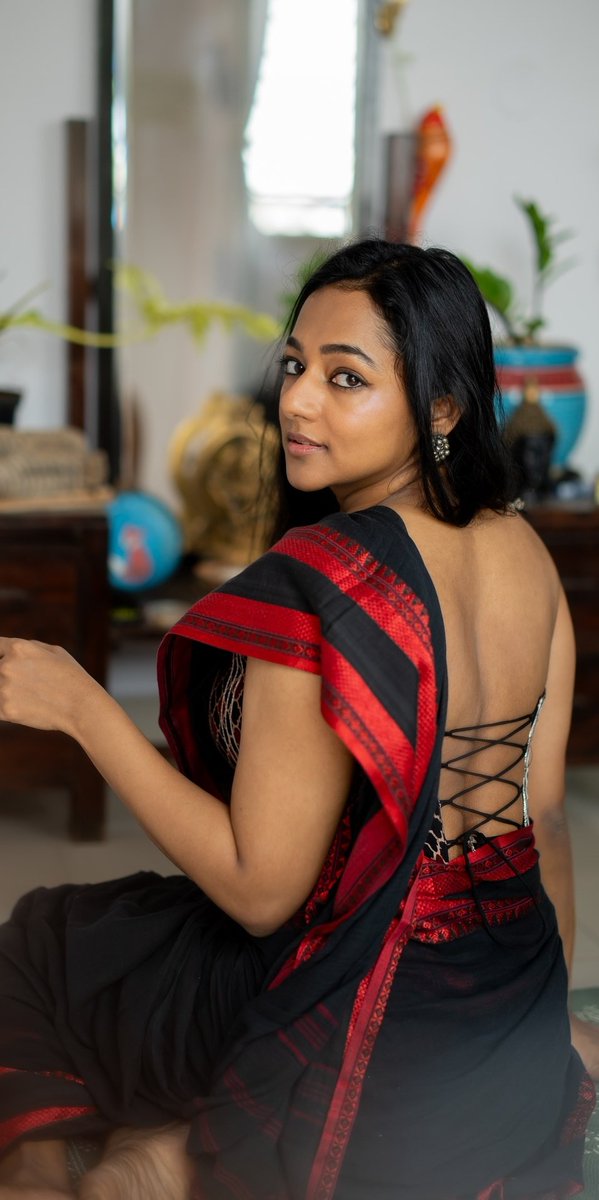 Duskiness Draped In Black Santhy Balachandran