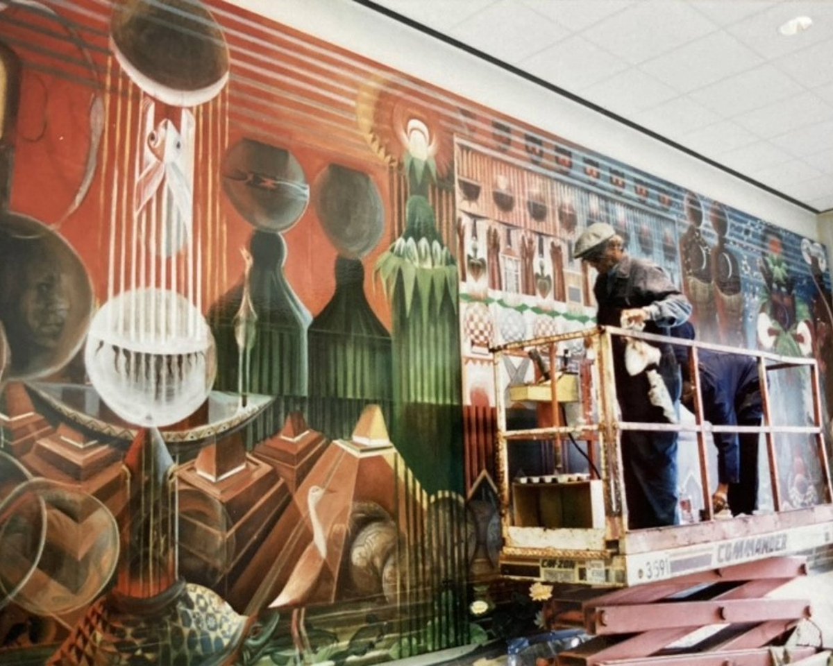 oxfordamerican's tweet image. “The fact that the murals are open, accessible, unguarded is part of what gives them their power.”
—In a feature article from @BurnawayGA, Daniel Fuller examines the importance of setting for John T. Biggers’s murals.
🔗: shorturl.at/MPt8o